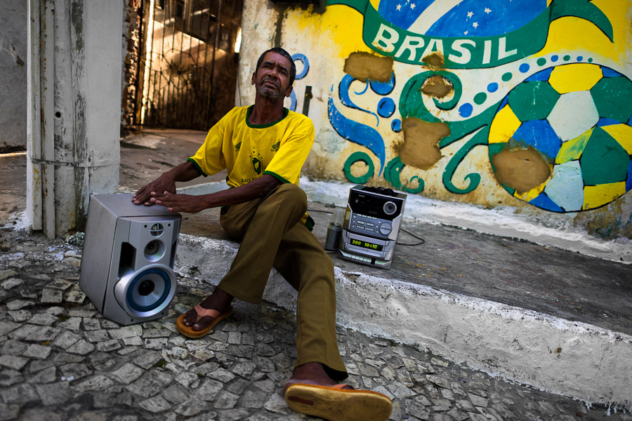 Brazilian man enjoys music playing on the street of Salvador, Bahia, Brazil.
