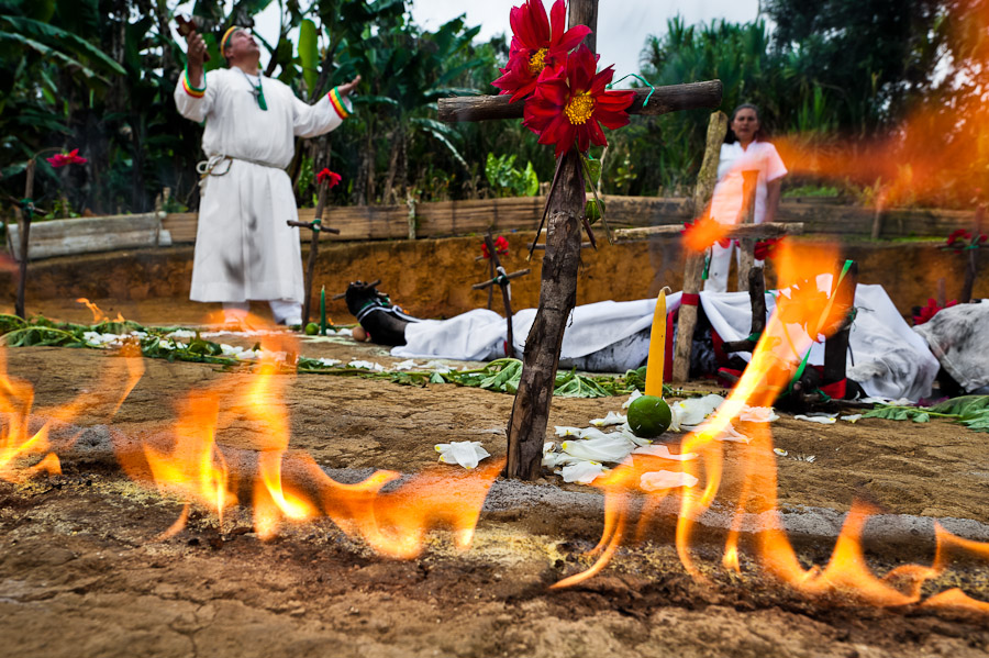 Hermes Cifuentes, a Colombian spiritual healer, performs a ritual of exorcism on Diana R., who claims to be possessed by spirits, in La Cumbre, Colombia.