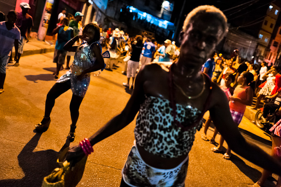 A Brazilian transvestite performs during the Carnival parade in the favela of Rocinha, Rio de Janeiro, Brazil.