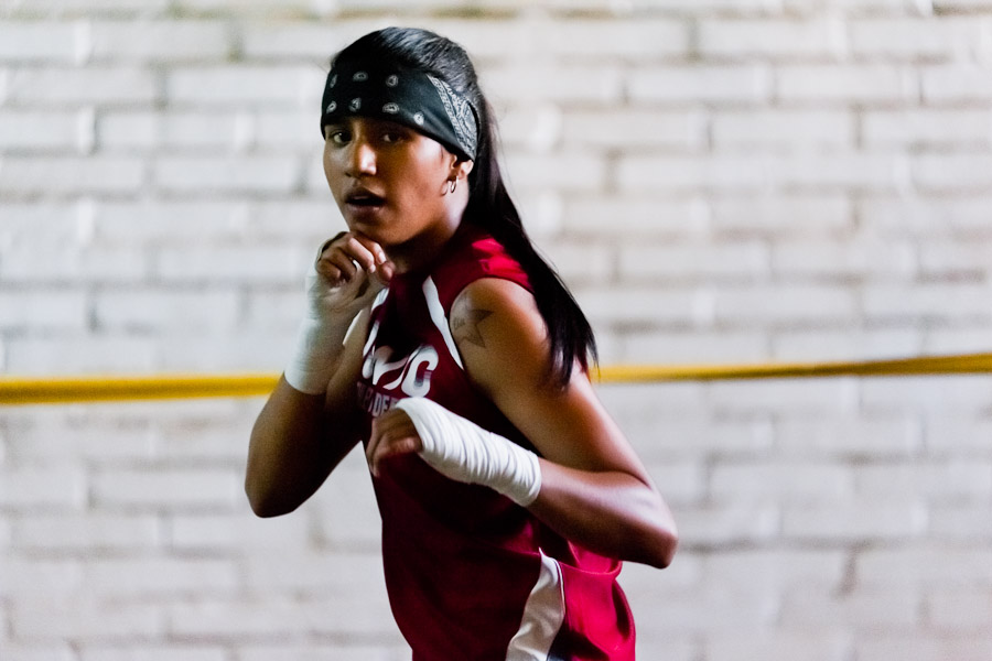 Geraldin Hamann, a young Colombian boxer, practices shadowboxing while training in the boxing gym in Cali, Colombia.