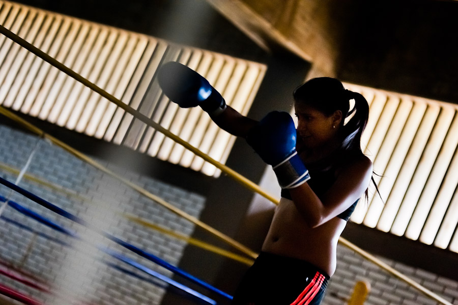 Geraldin Hamann, a young Colombian boxer, practices shadowboxing while training in the boxing gym in Cali, Colombia.