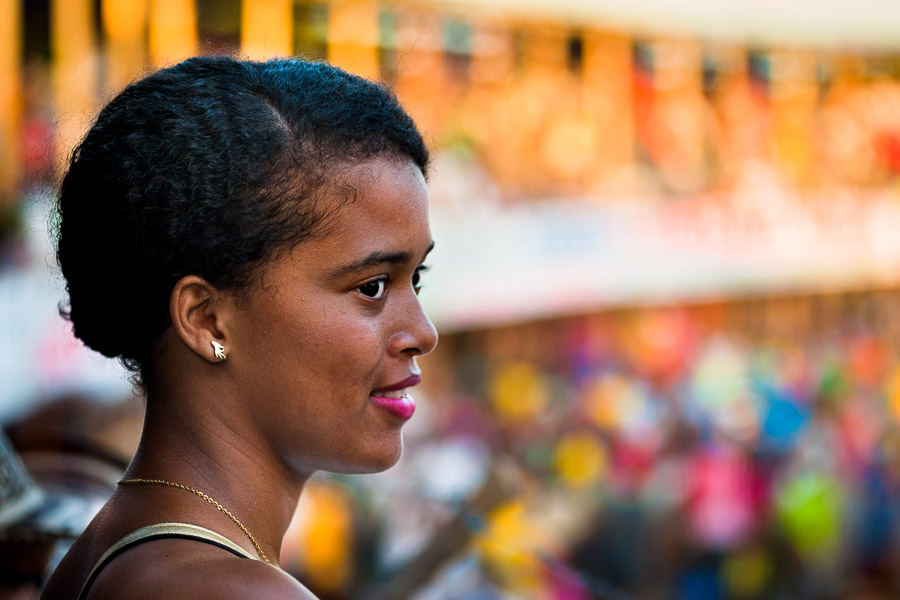 A Colombian girl, standing at the tribune, watches down the arena of Corralejas, a bullfighting festival in Soplaviento, Colombia.