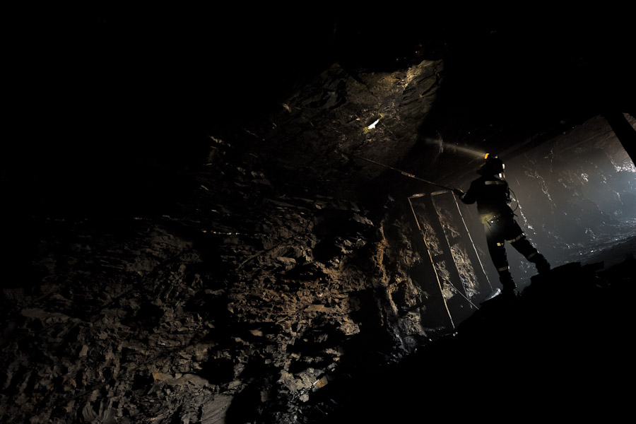 A miner works inside of a gold mine in La Rinconada, Peru.