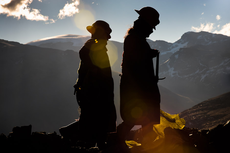 Women gold miners search for gold at high altitude (over 5500 m/18,000 ft) in the golden mine of La Rinconada, Peru.