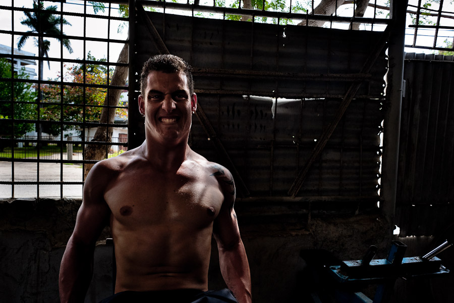 A young Cuban man trains at a bodybuilding gym in Alamar, a public housing complex in the Eastern Havana, Cuba.