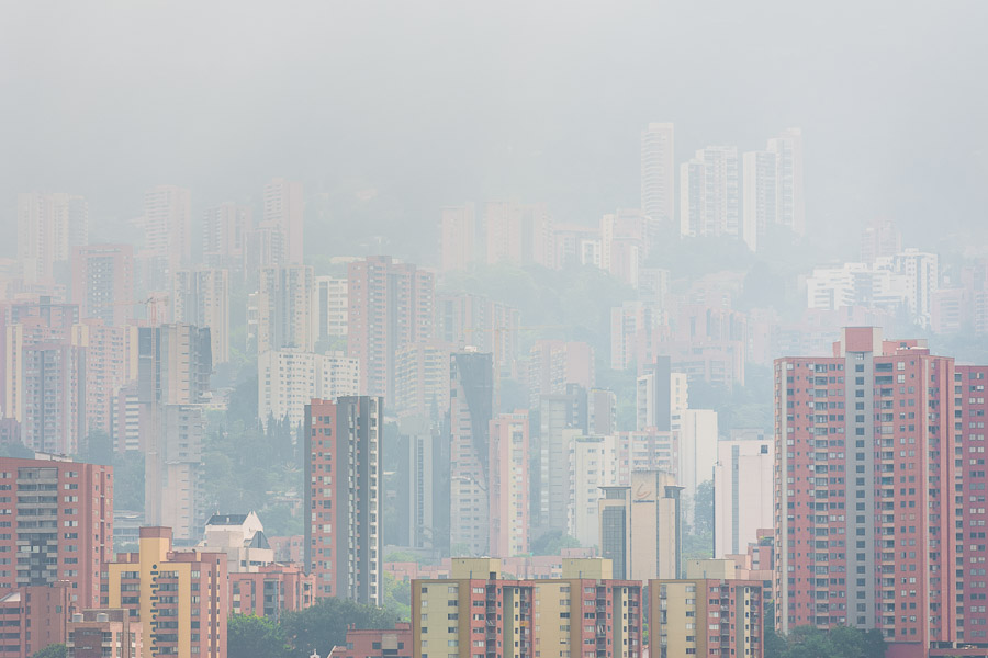 High rise luxury apartment buildings of El Poblado neighborhood are seen submerged in a morning fog in Medellín, Colombia.