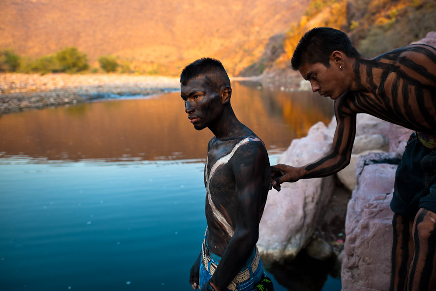 Cora Indians paint their bodies during Holy week in the mountains of Nayarit, Mexico.
