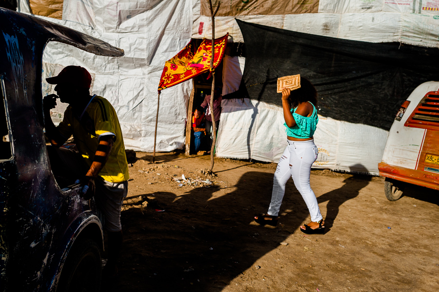 A Colombian girl walks around the arena of Corralejas, a bullfighting festival in Soplaviento, Bolívar department, Colombia.