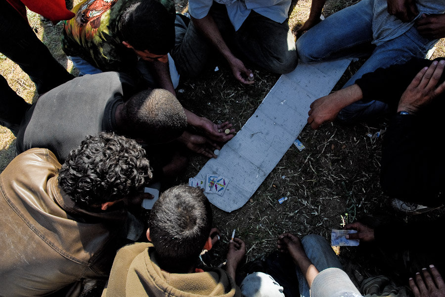 Harraga do not work. During the day they are just hanging around, they are playing cards. They wait for a night to try their luck, cross the sea and get to Europe.