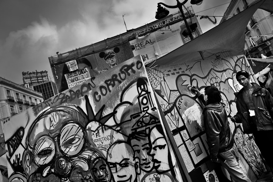 Spanish protesters (the grassroots ‘Indignados’ movement) camp in the tent city on Puerta del Sol square, Madrid, Spain.