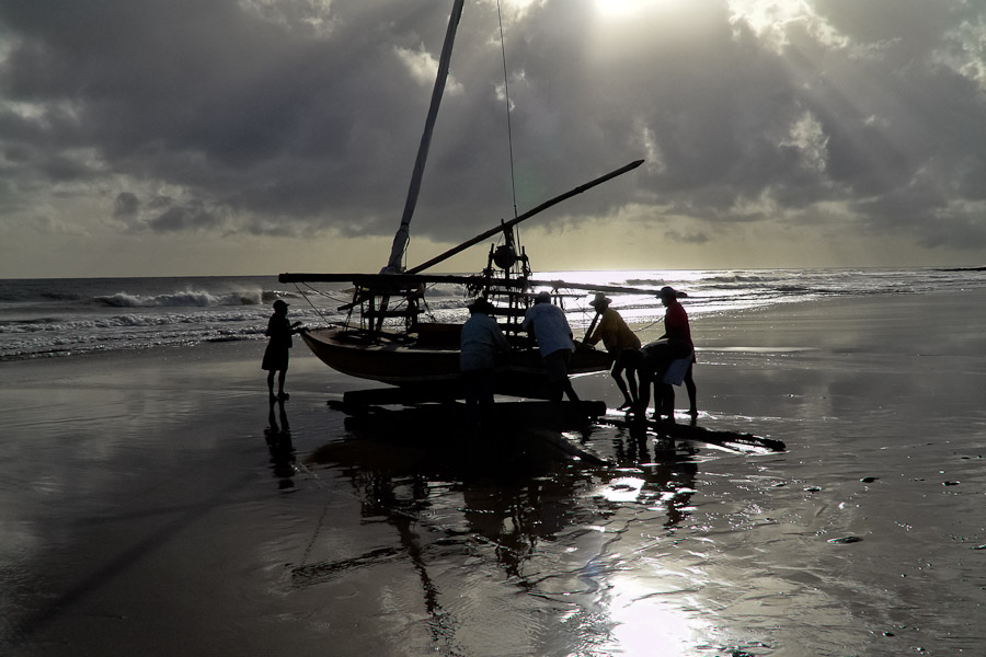 Jangadeiros, working on a unique wooden raft boat called jangada, keep the tradition of artisan fishing in Brazil for more than four hundred years.