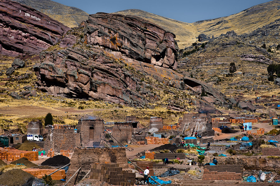 Kilns and piles of bricks are seen at a brick factory in the outskirts of Puno, Peru.