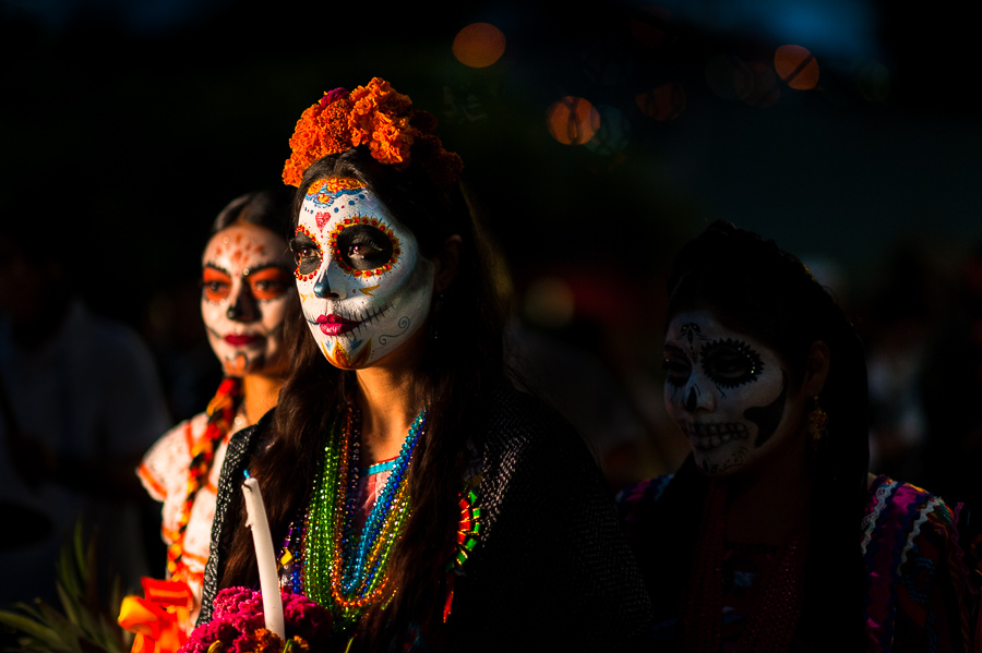 Young Mexican women, dressed as La Catrina, a Mexican pop culture icon representing the Death, take part in the Day of the Dead parade in Oaxaca, Mexico.