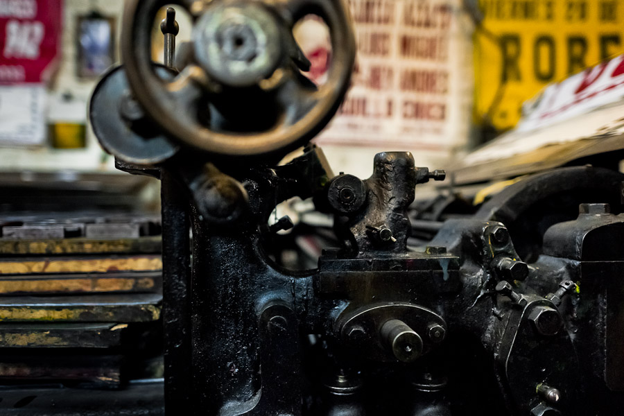 An ancient letterpress machine seen before a new load in the print shop in Cali, Colombia.