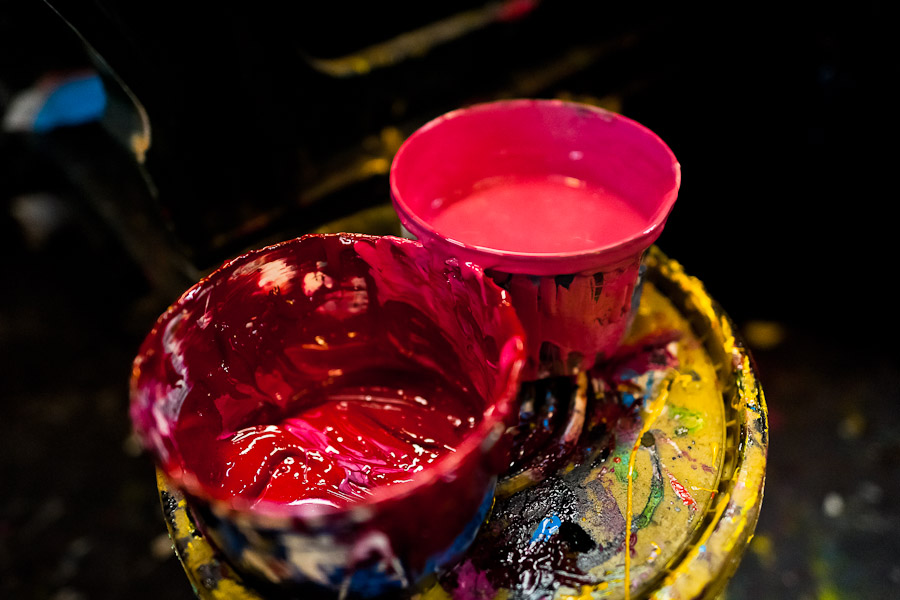 Buckets of red printing ink seen in the print shop in Cali, Colombia.