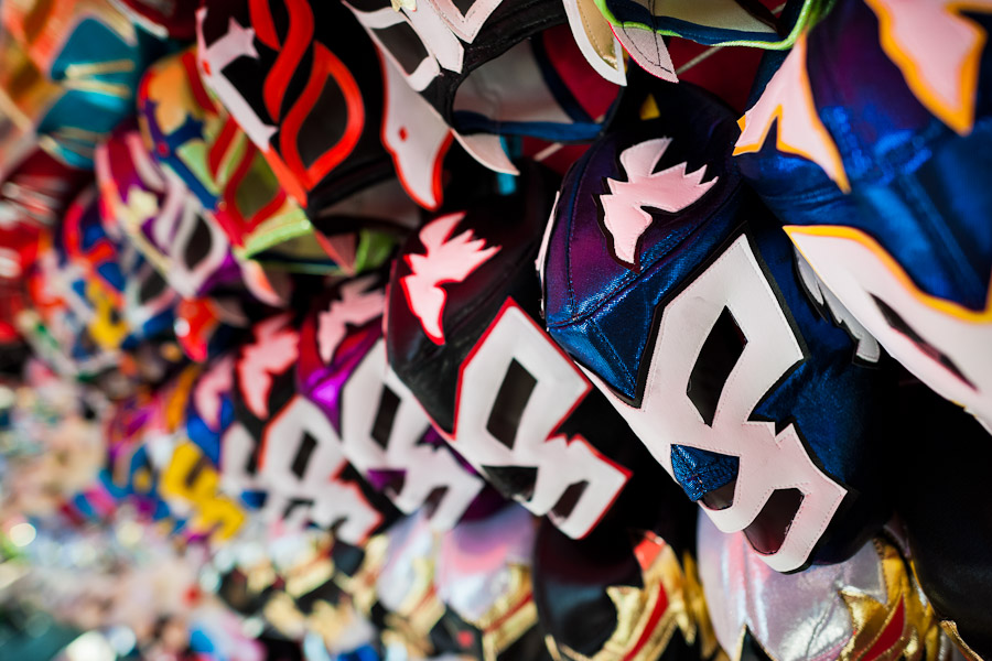 Colorful Lucha libre (Mexican wrestling) masks for sale in a street shop in Mexico City, Mexico.