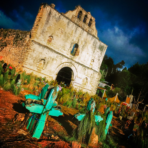 A Maya indigenous cemetery is seen in front of a ruined church of San Sebastian in San Juan Chamula, Chiapas, Mexico.