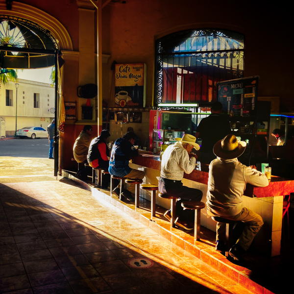 Mexican men, wearing cowboy hats, eat breakfast in a diner at the city’s market in Hermosillo, Sonora, Mexico.