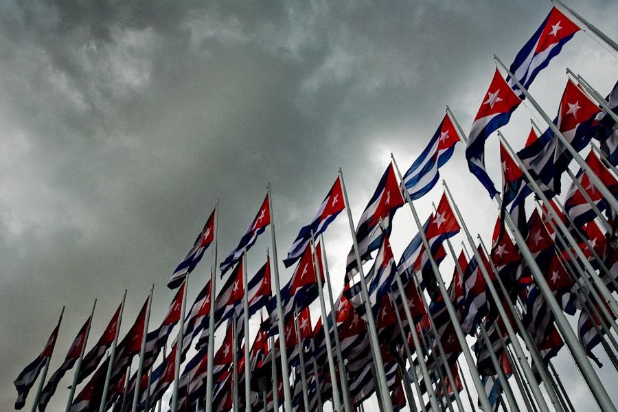 Cuban national flags wave in front of the U.S. Interest Section in Havana, Cuba, 13 August 2008.