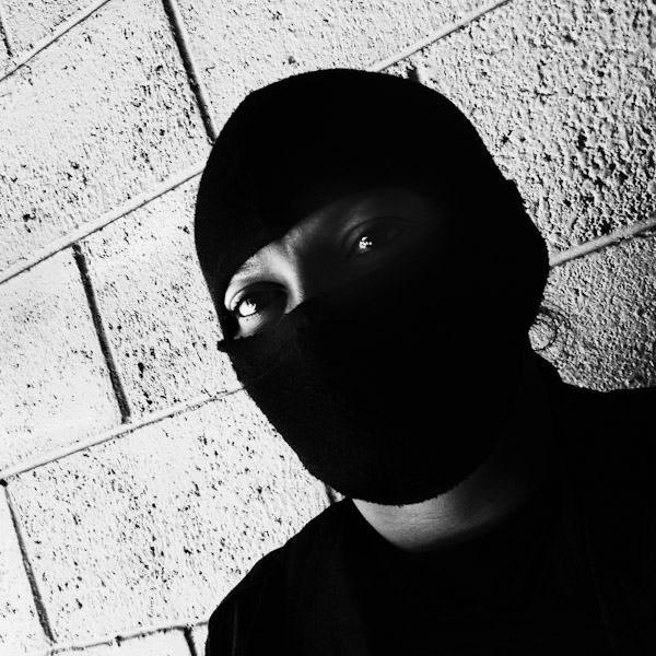 A member of the Police anti-gang unit, getting ready for an operation in the streets, stands on the base yard in San Salvador, El Salvador.