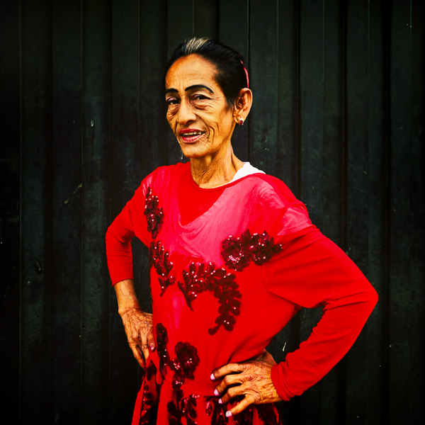 Janet León, a Colombian woman, poses for a picture in San Benito street in Medellín, Colombia.