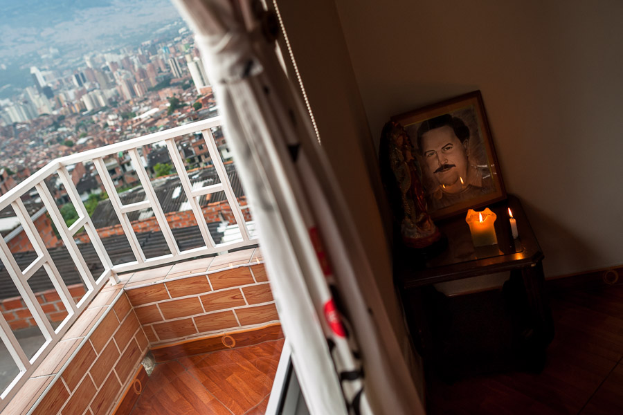 An altar in honor of the drug lord Pablo Escobar is seen placed in the living room corner of a house in the Pablo Escobar neighborhood, Medellín, Colombia.