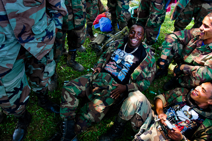 AUC, Autodefensas Unidas de Colombia (United Self-Defense Forces of Colombia) are giving off the weapons.