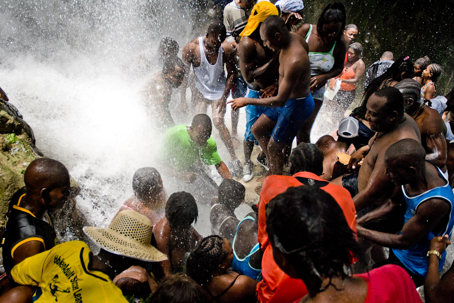 A spontaneous gathering of people under the Saut d'Eau waterfall shows the moment when some of the Vodou spirits of Iwa have manifested themselves.