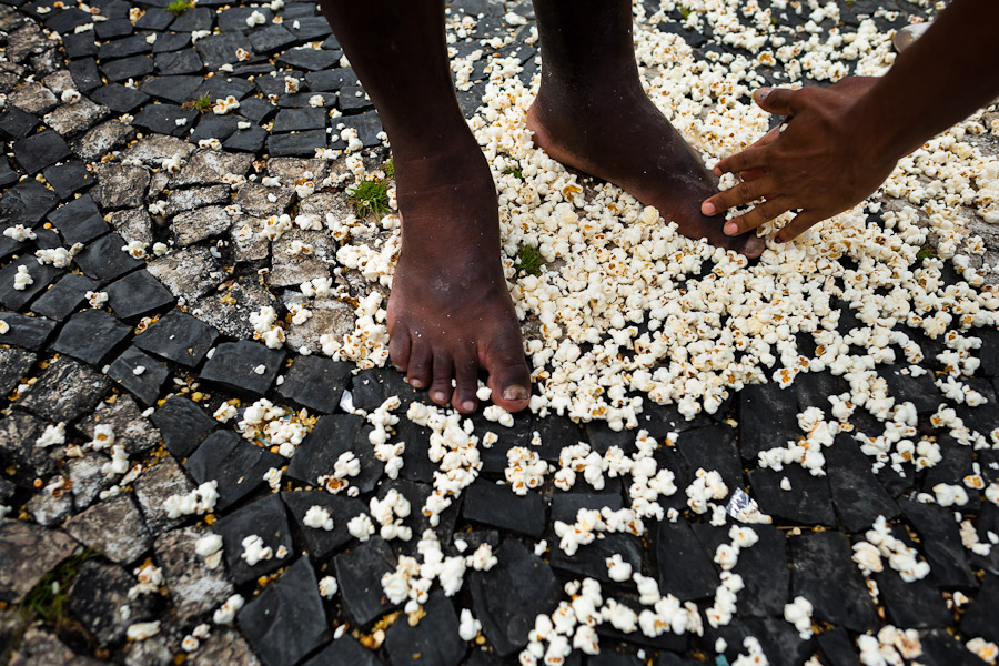 Feet of a Candomblé devotee seen during the ‘popcorn bath’, an Afro-Brazilian spiritual cleansing ritual performed in front of the St. Lazarus church in Salvador, Bahia, Brazil.