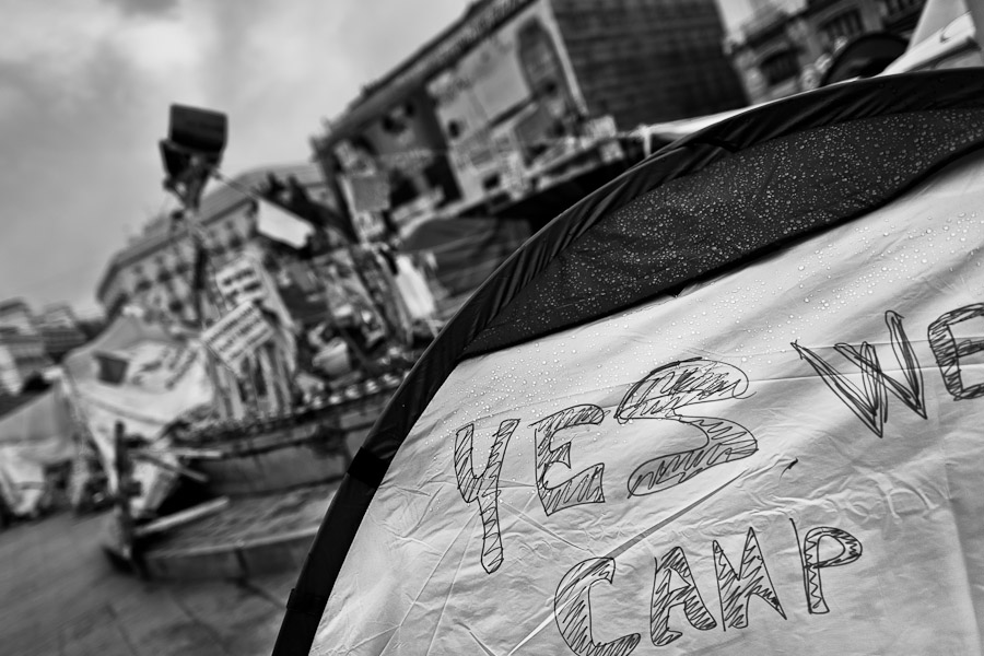 Spanish protesters (the grassroots ‘Indignados’ movement) camp in the tent city on Puerta del Sol square, Madrid, Spain.