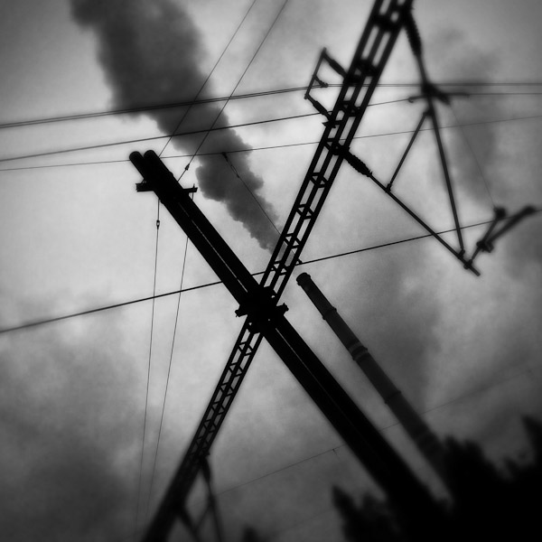 A smoking chimney of the Prunéřov I coal-fired power plant in the industrial area in the north of the Czech Republic.