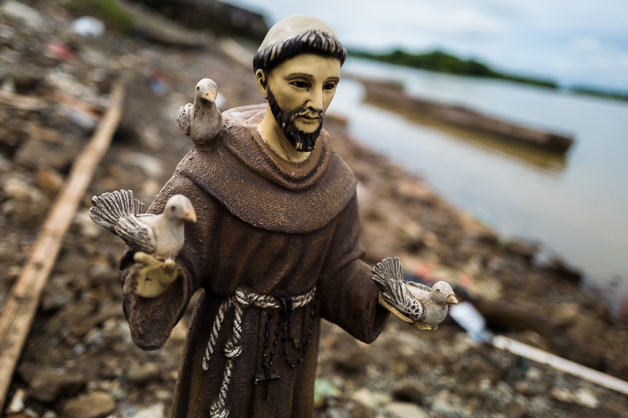 A statue of Saint Francis of Assisi, the patron saint of the town, is seen on the Atrato river shore during the San Pacho festival in Quibdó, Colombia.