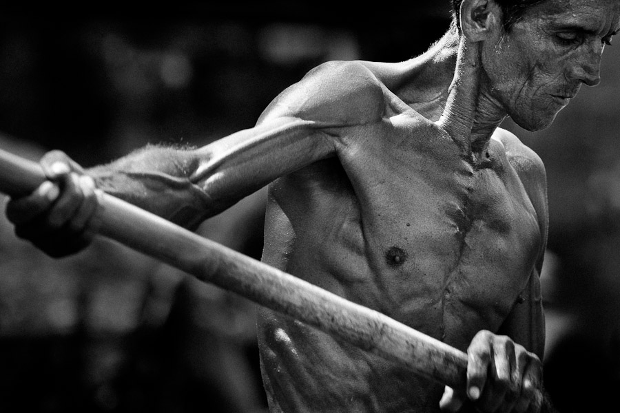 A sand miner loads sand extracted from the bottom of the river La Vieja in Cartago, Colombia.