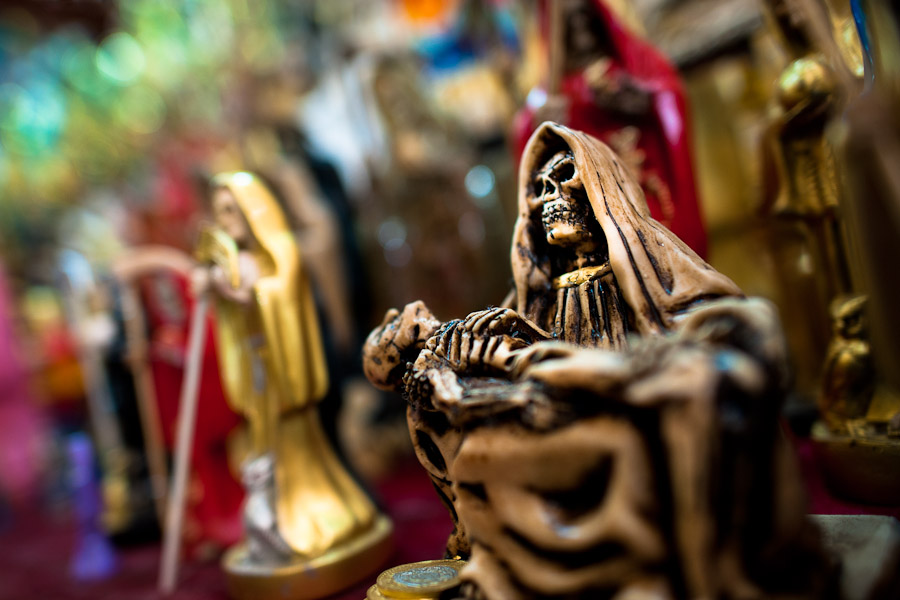 Figurines of Santa Muerte (Saint Death) sold in a witchcraft market in the center of Mexico City, Mexico.