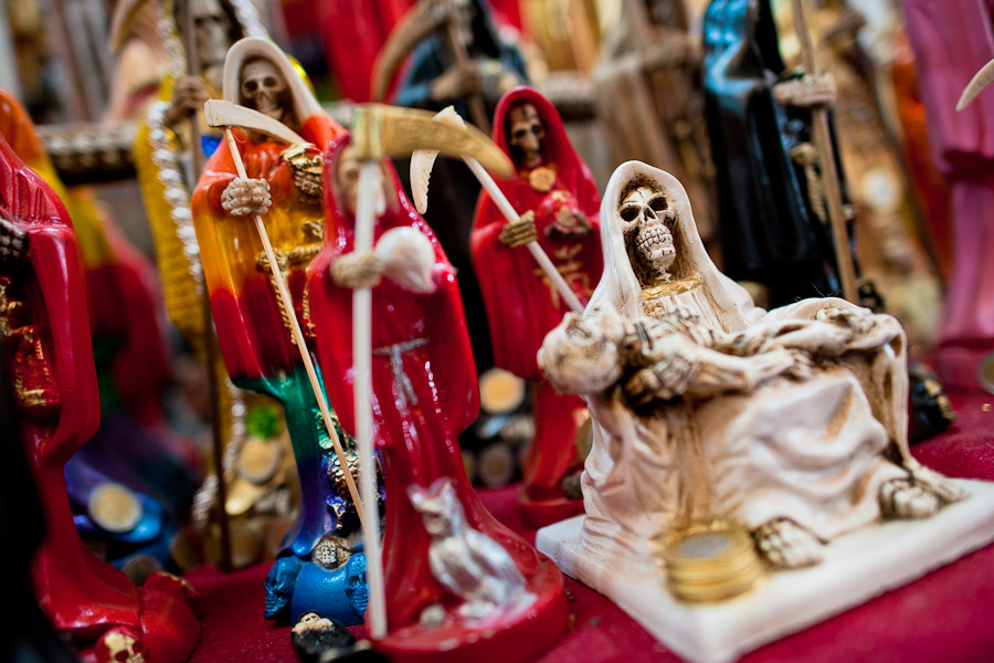 Statues of Santa Muerte (Saint Death) sold in a witchcraft market in the center of Mexico City, Mexico.