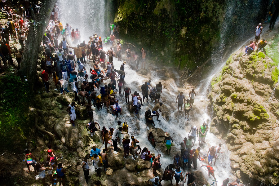Every year in summer thousands of pilgrims from all over Haiti make the religious journey to the Saut d'Eau waterfall in Haiti.