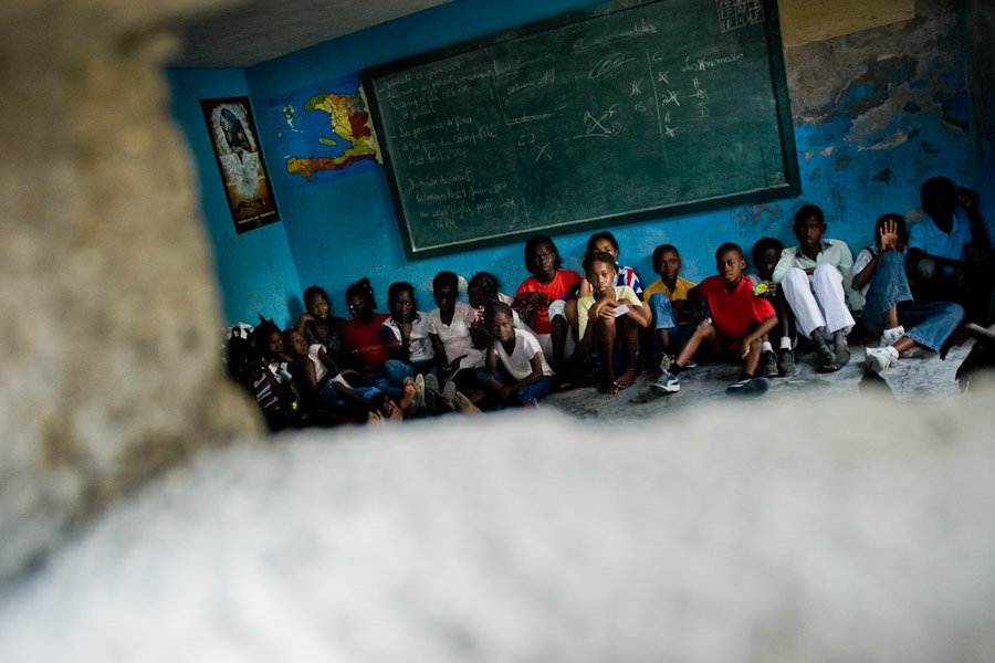 An improvised classroom of a basic school run by a community leader in the slum of Cité Soleil, Port-au-Prince, Haiti.