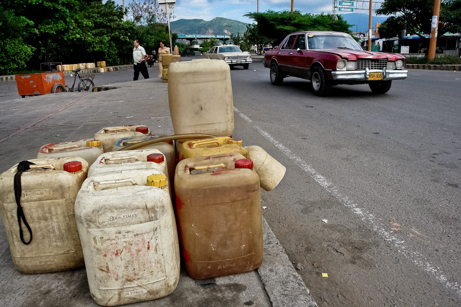 The gasoline price in Venezuela is the cheapest in the world. It is about 12 cents (USD) a gallon. The smuggled barrels are sold along the highways in the Colombian border region.