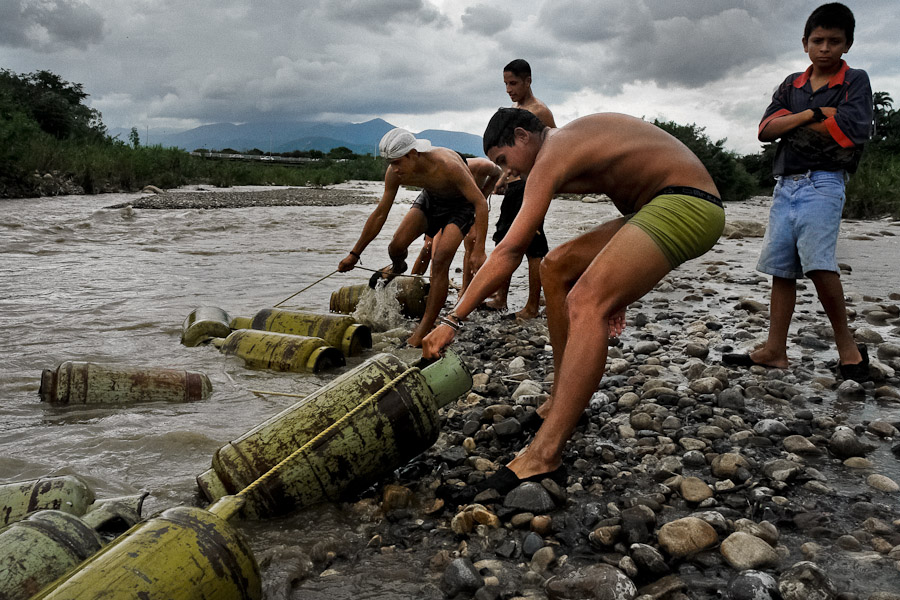 Gas and gasoline smugglers are often chased by Venezuelan Guardia Nacional who - inspite of being bribed - shoot at the smugglers non-lethal projectiles and then sell the abandoned contraband.