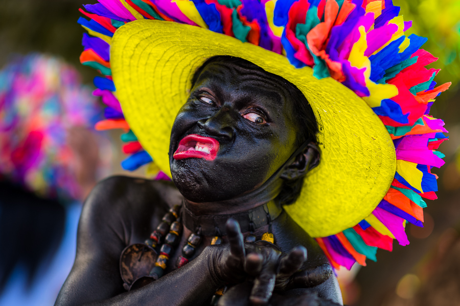 An Afro-Colombian man, a member of the folkloric group Son de Negro, shows an emotional grimace during the preparations for the parade of the Carnival in Barranquilla, Colombia.