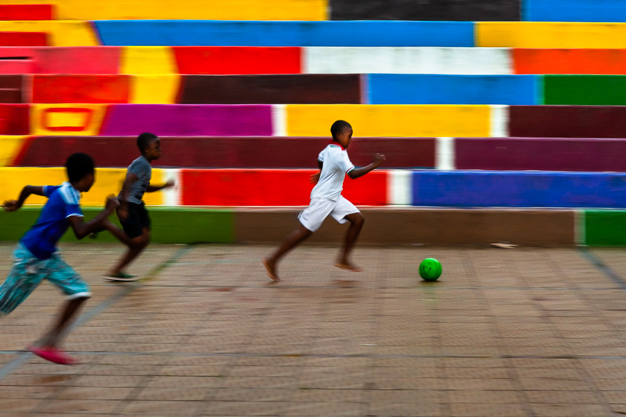 Afro-Colombian boys play street football on the Malecón in Quibdó, Chocó, Colombia.
