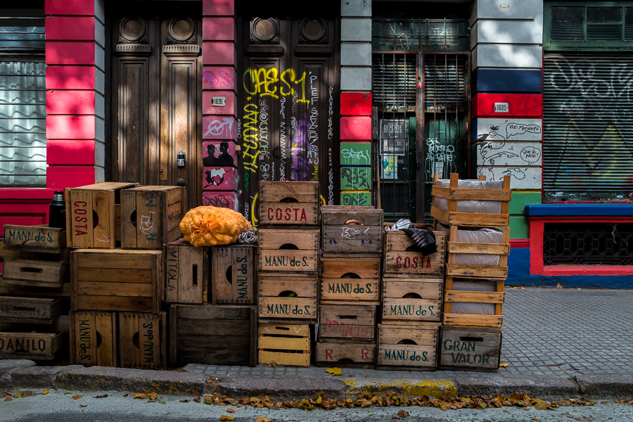 Wooden fruit crates are seen piled on the sidewalk at the Tristán Narvaja street market in Montevideo, Uruguay.