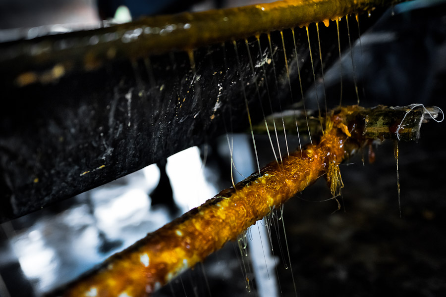 Solidified sticky fibres of sugar cane juice seen during the processing of panela in a rural sugar cane mill in Valle del Cauca, Colombia.