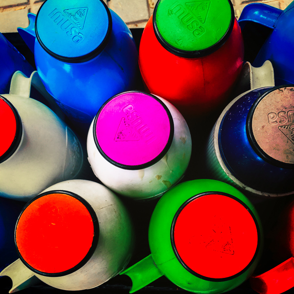 Plastic vacuum flasks, filled with black coffee called ‘tinto’, are seen in a street vendor’s cart in Bogotá, Colombia.