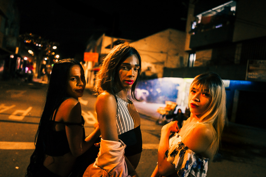 A Colombian transsexual women walk in the night streets of “El Bronx”, a high-crime area in the center of Medellín, Colombia.