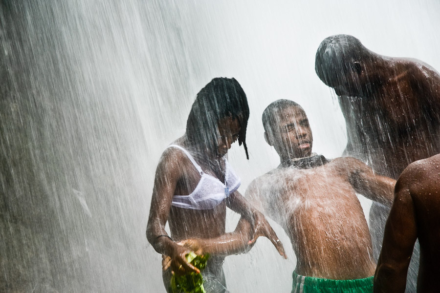 A Haitian man seen in trance under the waterfall, supposedly possessed by a Voodoo spirit, during the annual religious pilgrimage in Saut d'Eau, Haiti.