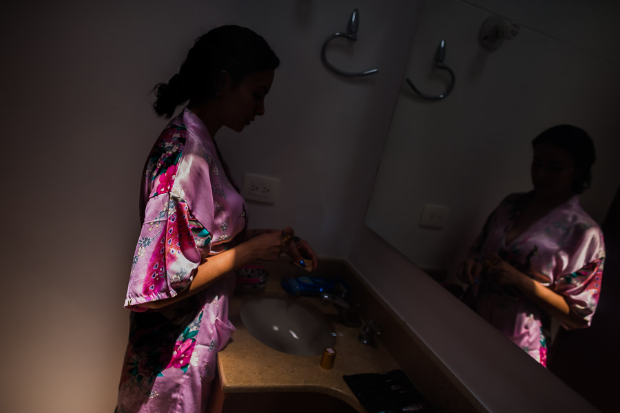 A Colombian webcam model, known as Sthephanie Mwarnert, applies the make-up before performing a live show, broadcasted online from her apartment in Medellín, Colombia.