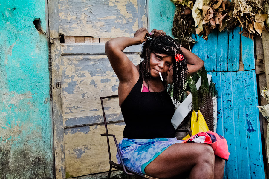 A Brazilian woman selling herbs in the Mercado São Joaquim, Salvador da Bahía, Brazil.