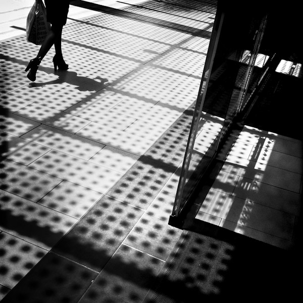 An Ecuadorian woman, a member of the higher social class, walks in a shopping center in Quito, Ecuador.