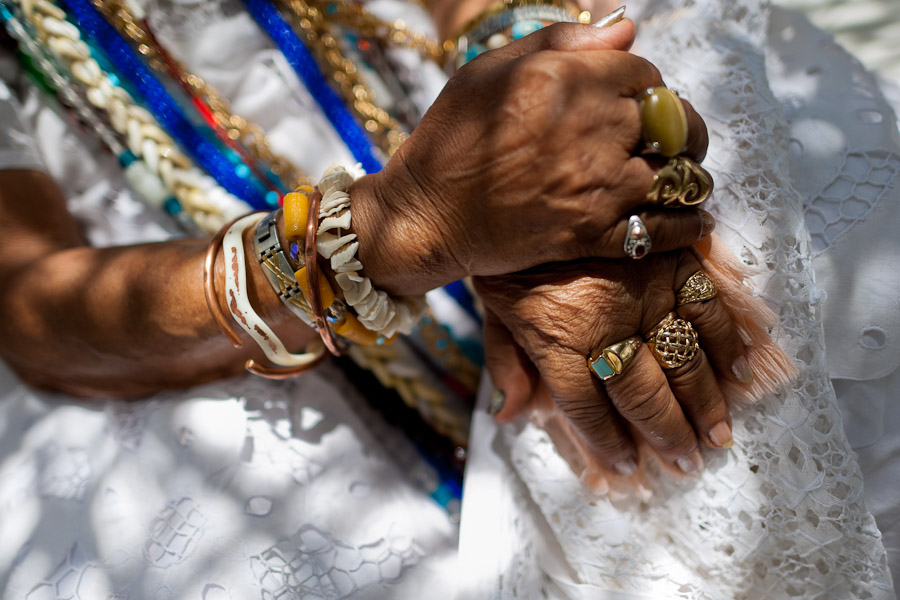 Hands of a priestess of Candomblé (Mãe-de-santo, iyalorishá) seen during the ritual ceremony in honor to Yemanjá, the goddess of the sea, in Cachoeira, Bahia, Brazil.